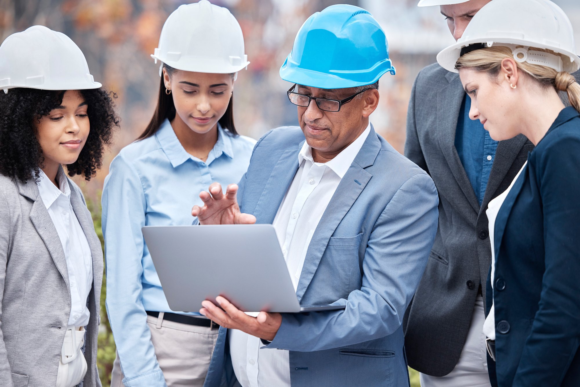 teamwork-engineer-and-leader-of-people-with-lapto-2023-11-27-05-16-13-utc